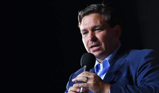 Florida Gov. Ron DeSantis speaks during a campaign rally for then-President Donald Trump at Pensacola International Airport in Pensacola, Florida, on Oct. 23, 2020.
