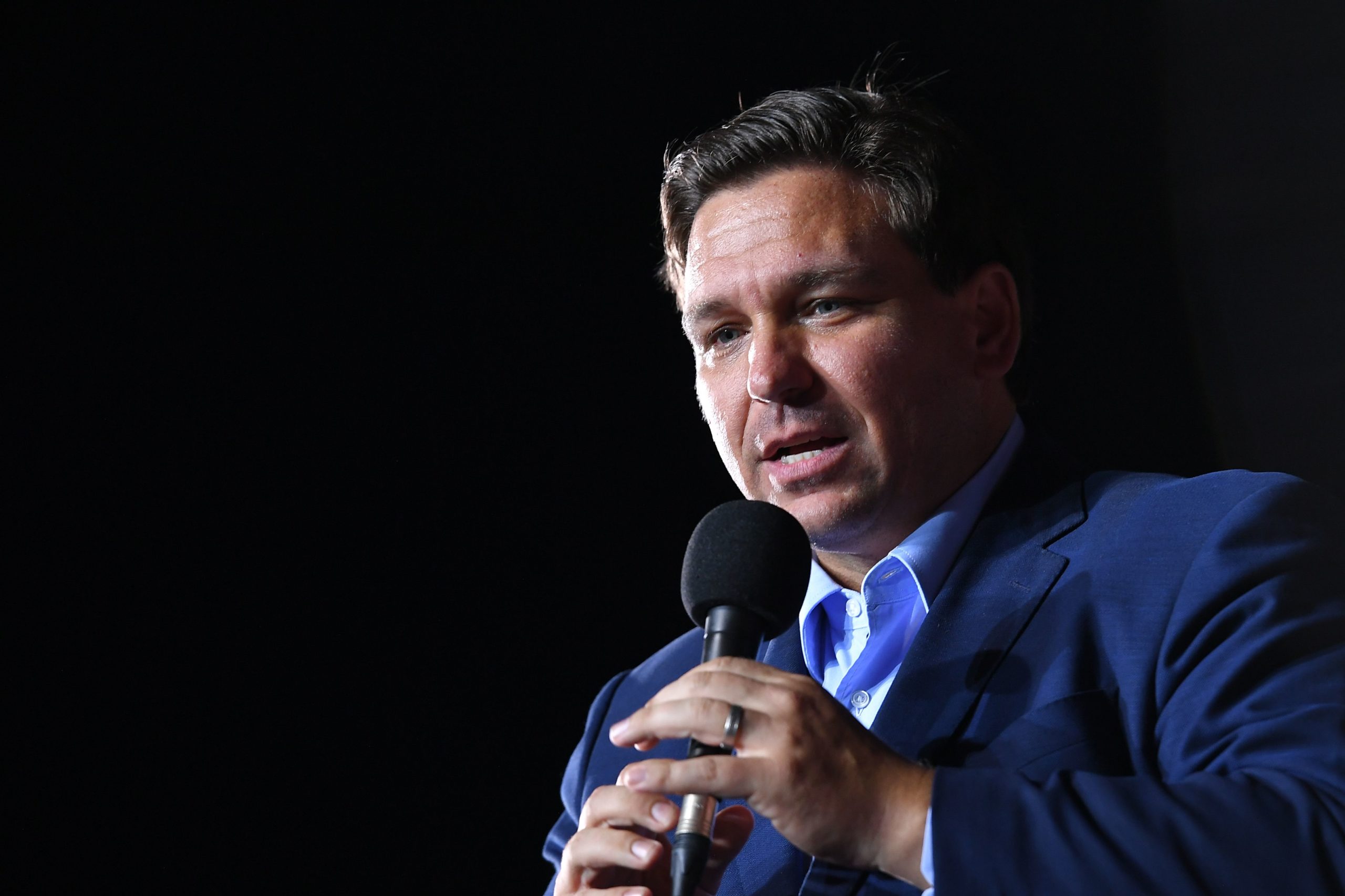 Florida Gov. Ron DeSantis speaks during a campaign rally for then-President Donald Trump at Pensacola International Airport in Pensacola, Florida, on Oct. 23, 2020.