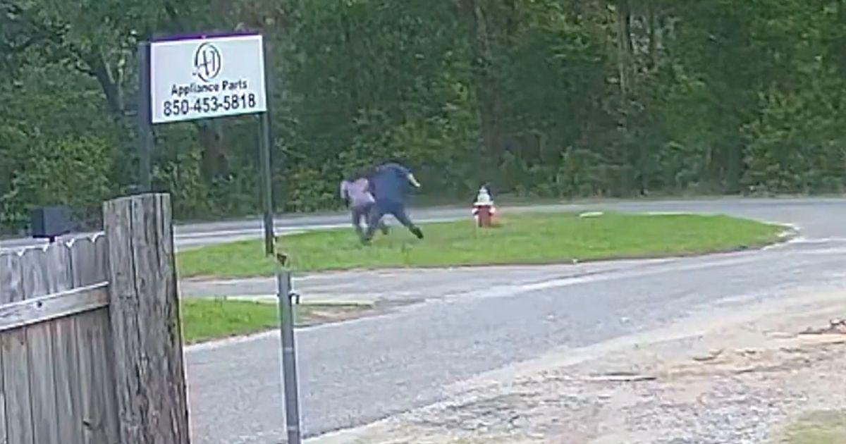 An 11-year-old girl fights her attempted kidnapper Tuesday morning in Pensacola, Florida.