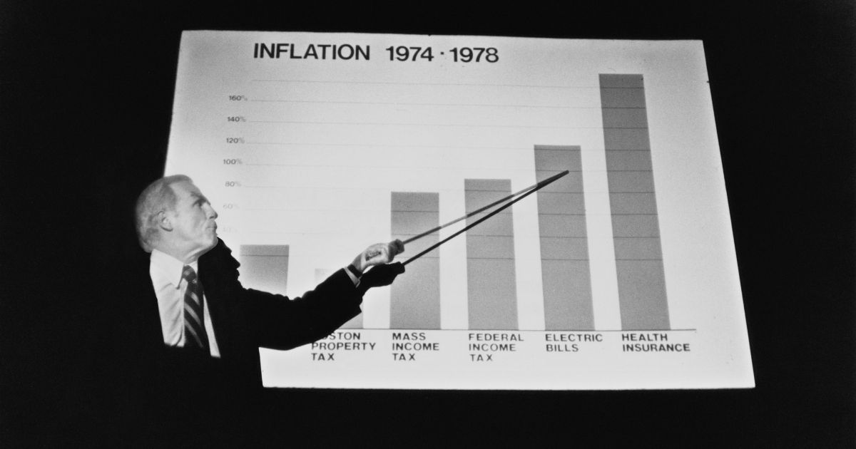 Boston Mayor Kevin White points to a chart showing inflation in different categories on Sept. 25, 1978.