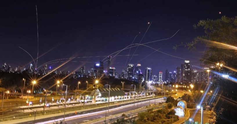 Israel's Iron Dome air defence system intercepts rockets above the coastal city of Tel Aviv on Saturday, following their launching from the Gaza Strip controlled by the Palestinian Hamas movement.