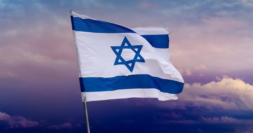 An Israeli flag is pictured in Jerusalem in the stock image above.