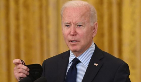 President Joe Biden speaks in the East Room of the White House in Washington, D.C., on Friday.