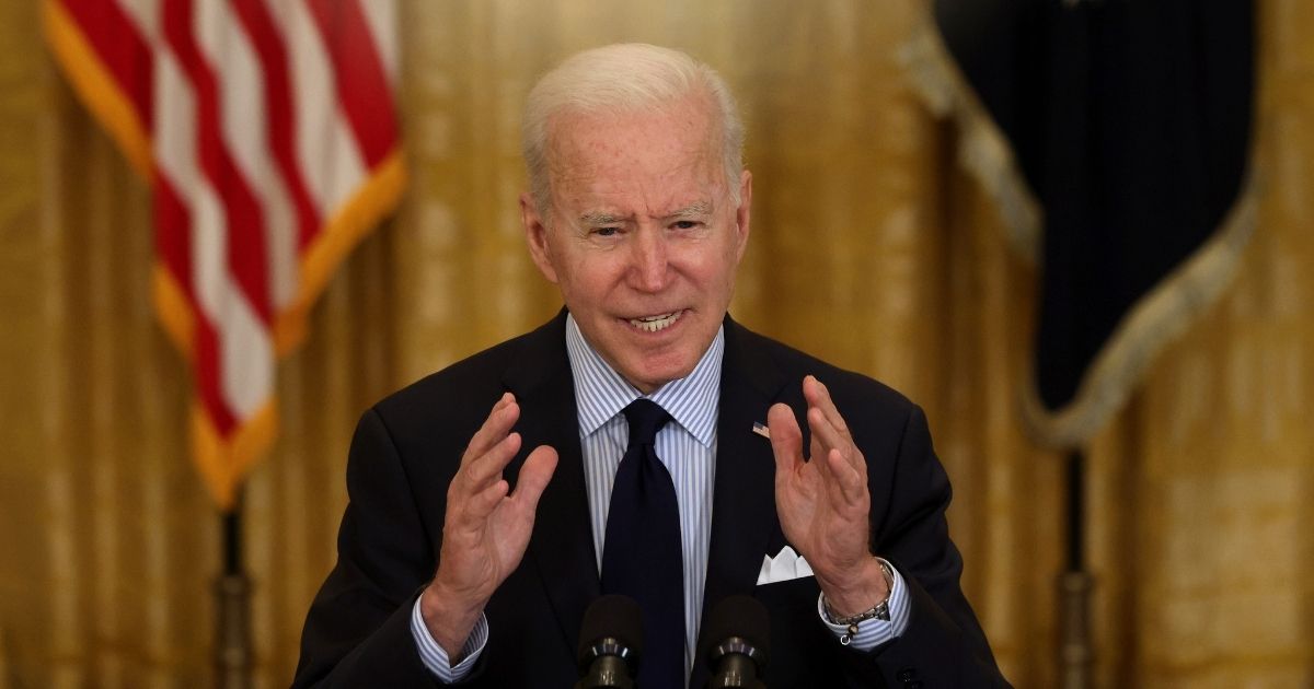 President Joe Biden speaks at the East Room of the White House on Friday in Washington, D.C.