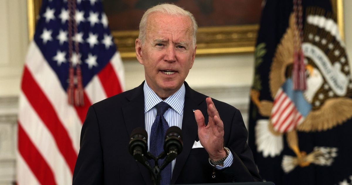 President Joe Biden delivers remarks during an event at the State Dining Room of the White House on Tuesday in Washington, D.C.