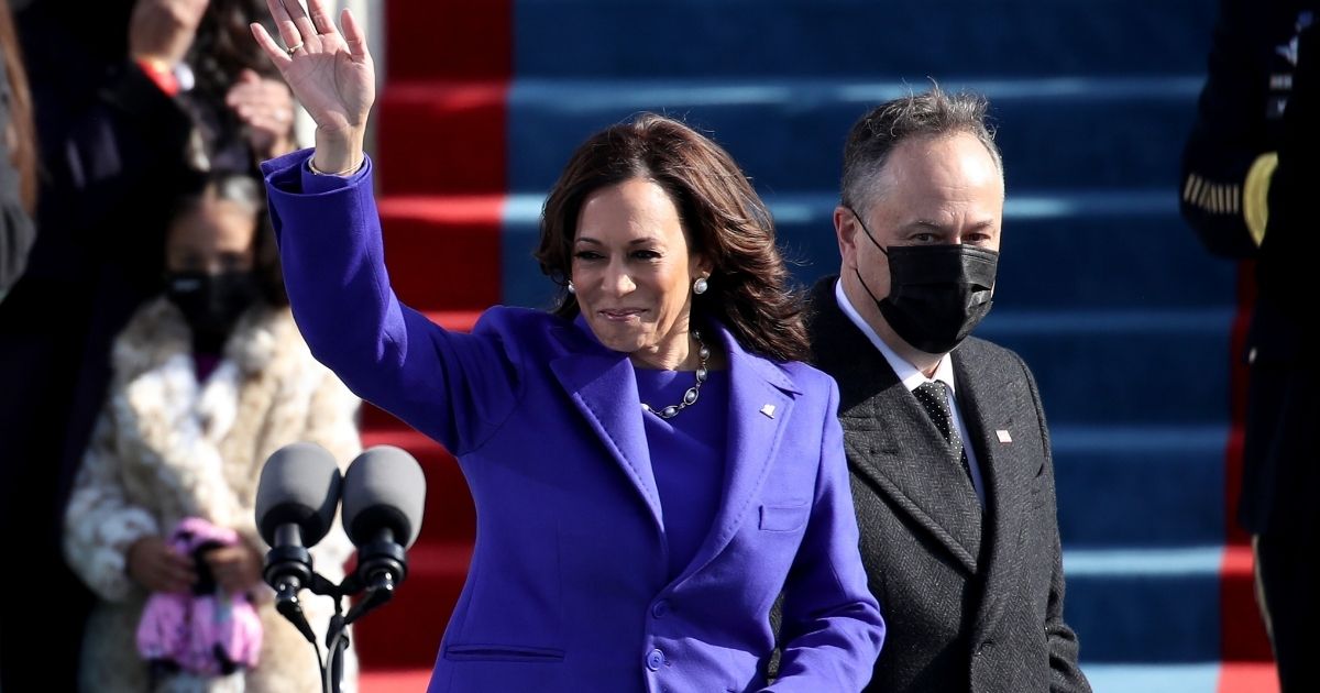 Newly sworn in U.S. Vice President Kamala Harris and her husband Doug Emhoff wave at the inauguration of U.S. President-elect Joe Biden on the West Front of the U.S. Capitol on Jan. 20 in Washington, D.C.