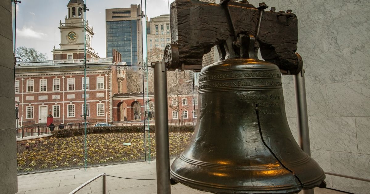 The Liberty Bell and Independence Hall in the background are seen at Philadelphia's Independence National Historic Site in the photo above.