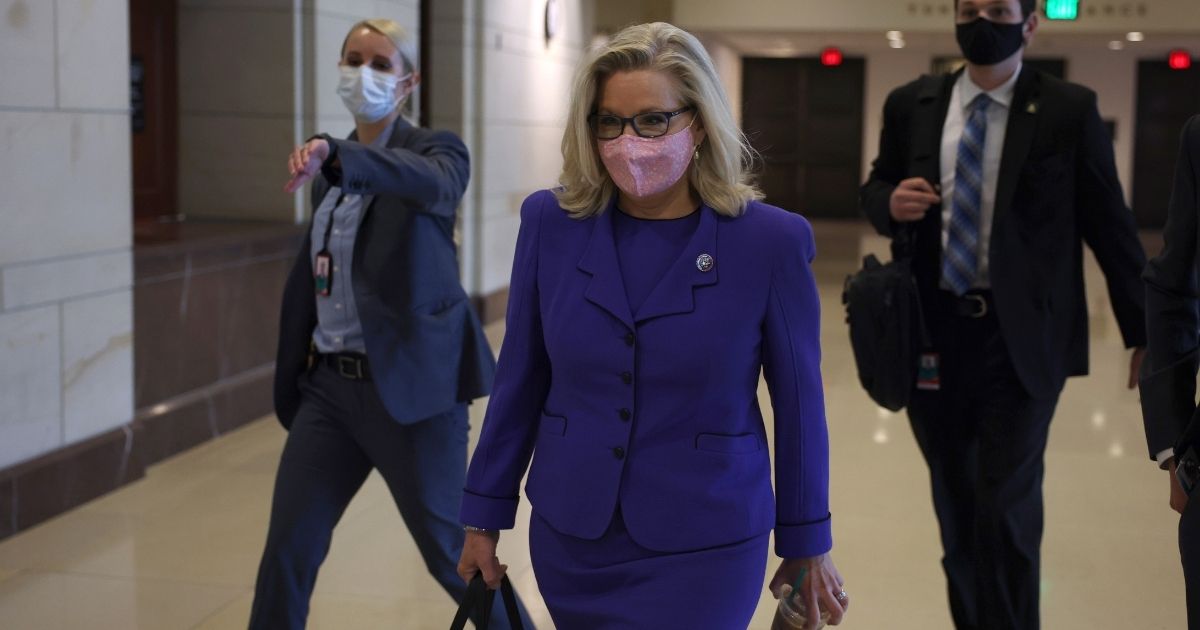 Wyoming GOP Rep. Liz Cheney arrives for a caucus meeting in the U.S. Capitol Visitors Center on Wednesday in Washington, D.C.
