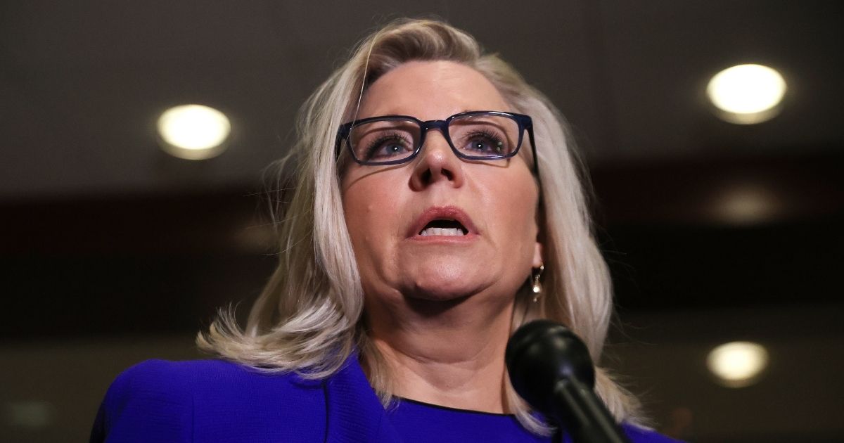 Wyoming GOP Rep. Liz Cheney talks to reporters after House Republicans voted to remove her as conference chair in the U.S. Capitol Visitors Center on Wednesday in Washington, D.C.