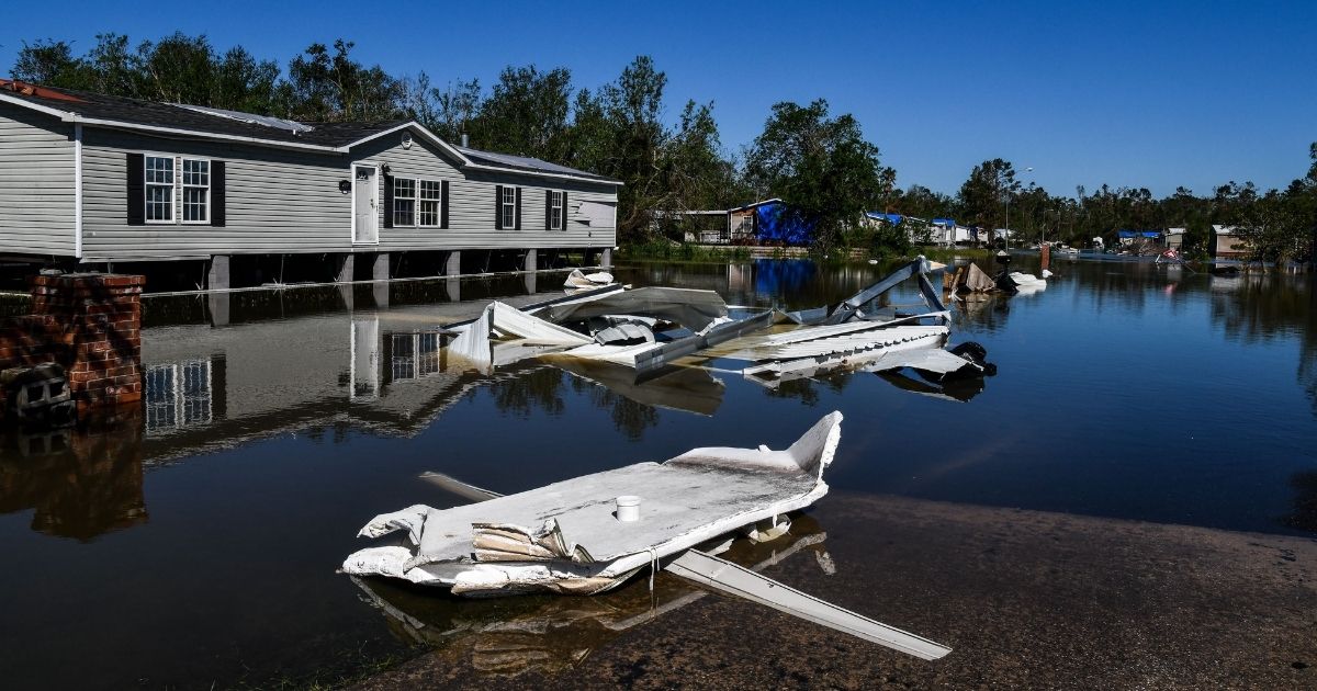 Houses are surrounded by flood waters after Hurricane Delta passed through the area on Oct. 10, 2020, near Lake Charles, Louisiana.