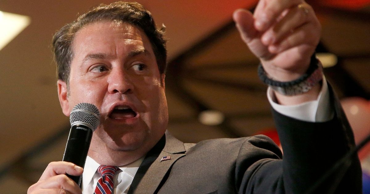 In this Nov. 4, 2014, file photo, Arizona then-Republican candidate for Attorney General Mark Brnovich talks to supporters at the Republican election night party in Phoenix.
