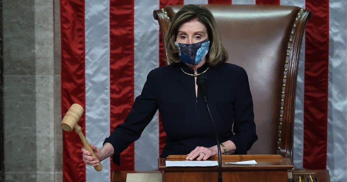 Democratic Speaker of the House Nancy Pelosi raps her gavel in the House Chamber of the U.S. Capitol Jan. 13, 2021, in Washington, D.C.