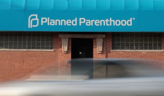 A motorist passes a Planned Parenthood clinic on May 18, 2018, in Chicago.