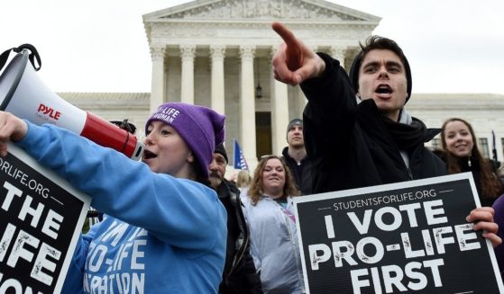 Pro-life activists demonstrate in front of the the US Supreme Court during the 47th annual March for Life on Jan. 24, 2020, in Washington, D.C.