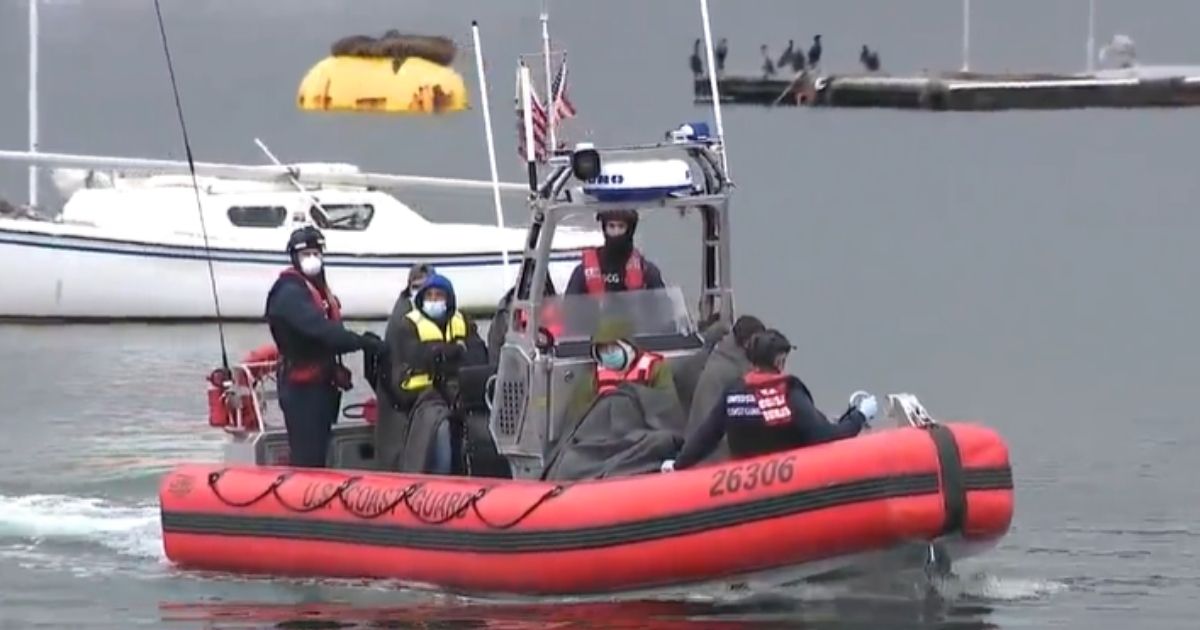 A Coast Guard boat carries some of the illegal immigrants rescued from a panga off the California coast.