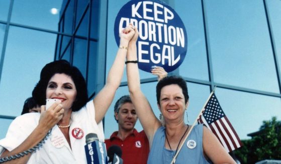 Attorney Gloria Allred, left, and Norma McCorvey, right, the "Jane Roe" plaintiff from the landmark court case Roe vs. Wade, during a pro-choice rally on July 4, 1989, in Burbank, California.