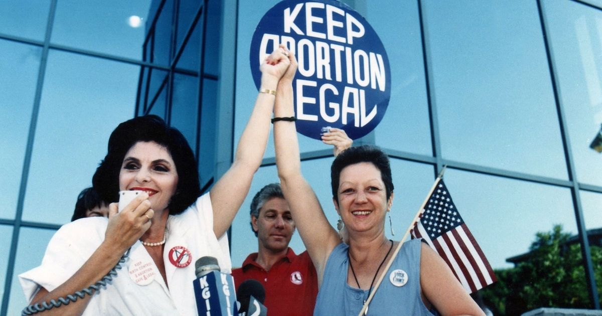 Attorney Gloria Allred, left, and Norma McCorvey, right, the "Jane Roe" plaintiff from the landmark court case Roe vs. Wade, during a pro-choice rally on July 4, 1989, in Burbank, California.