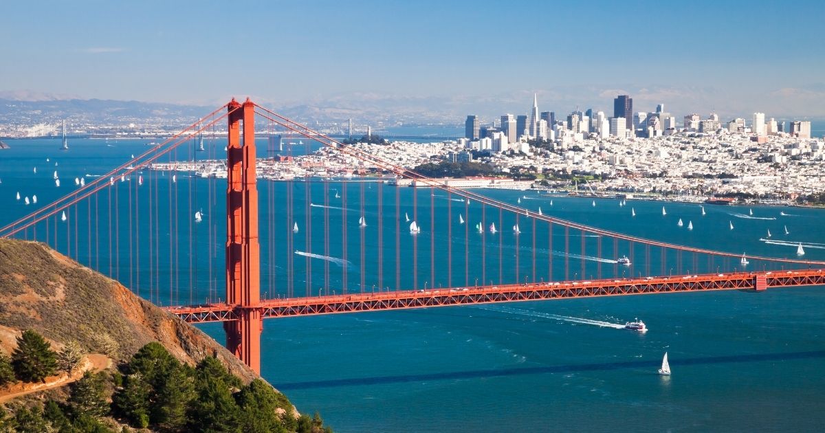 A panorama shows San Francisco and the Golden Gate Bridge.
