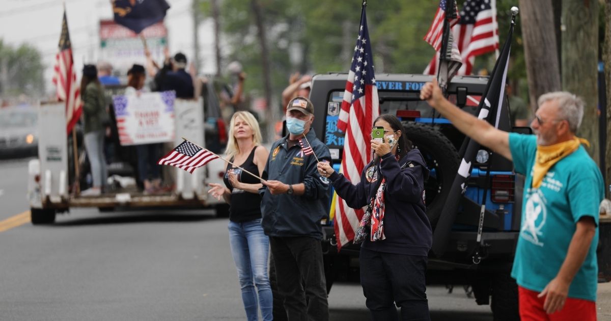 People participate in the annual Memorial Day Parade in the Staten Island borough of New York City on May 25, 2020.
