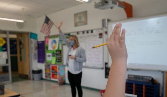 Third grade teacher Cara Denison takes questions on Nov. 19, 2020, in Stamford, Connecticut.