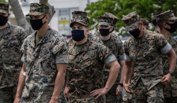 U.S. Marines prepare to receive the Moderna coronavirus vaccine at Camp Hansen in Okinawa, Japan, on April 28, 2021.