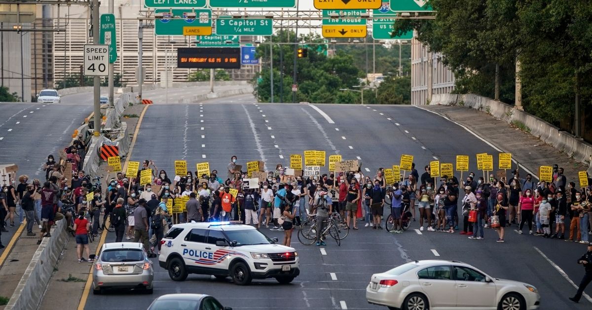 Protesters block traffic on Interstate 395 last June in Washington.