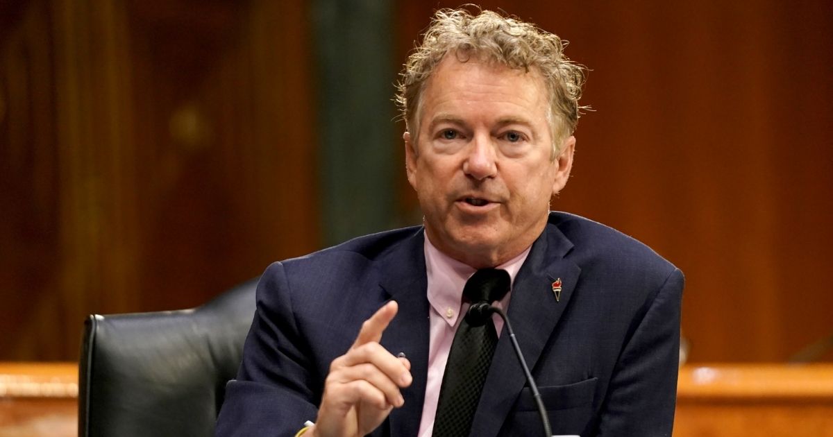 Sen. Rand Paul of Kentucky questions Dr. Anthony Fauci, director of the National Institute of Allergy and Infectious Diseases, during a May 11 committee hearing on the federal response to COVID-19.