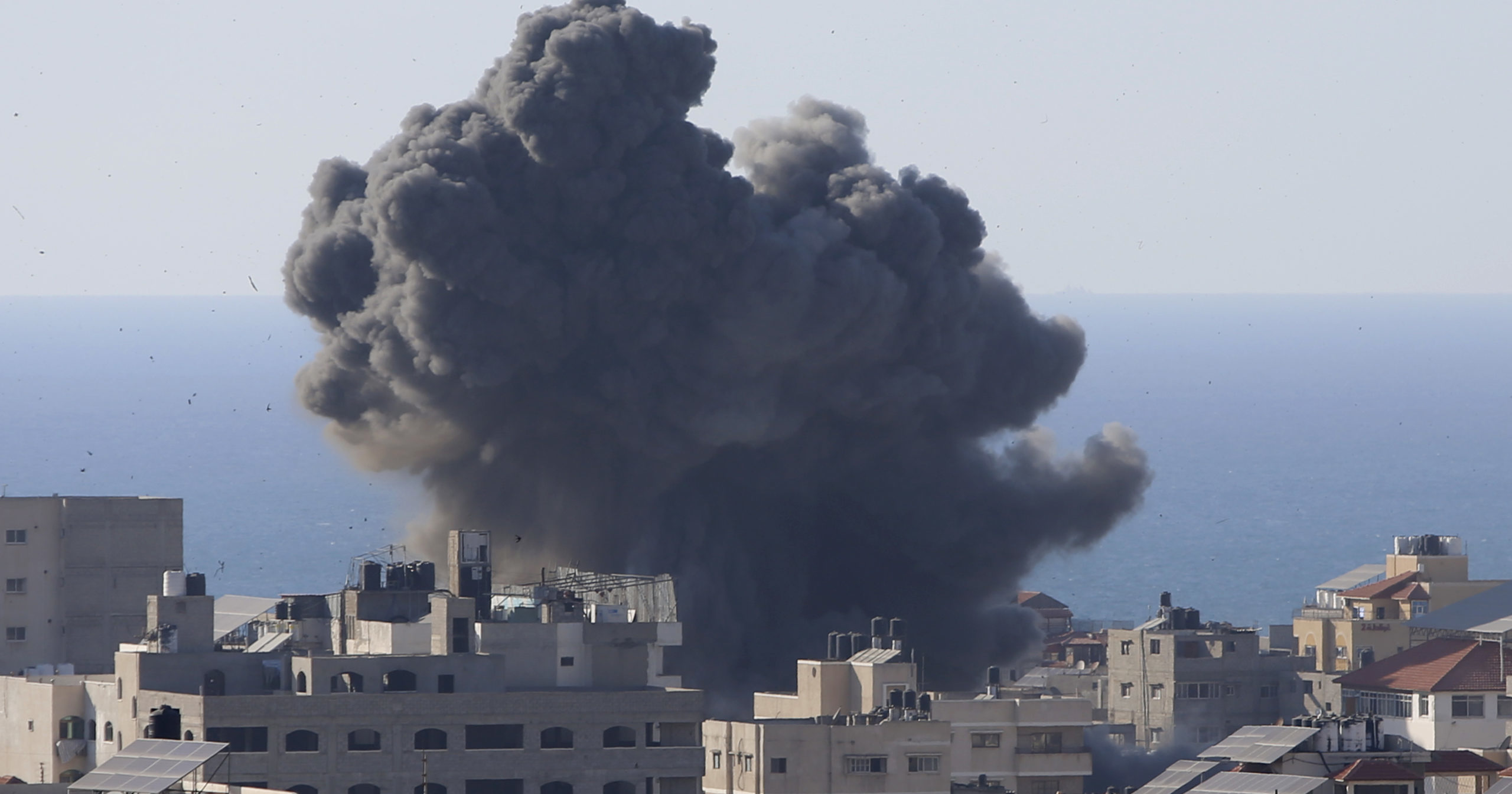 Smoke rises following Israeli airstrikes on a building in Gaza City on Friday.