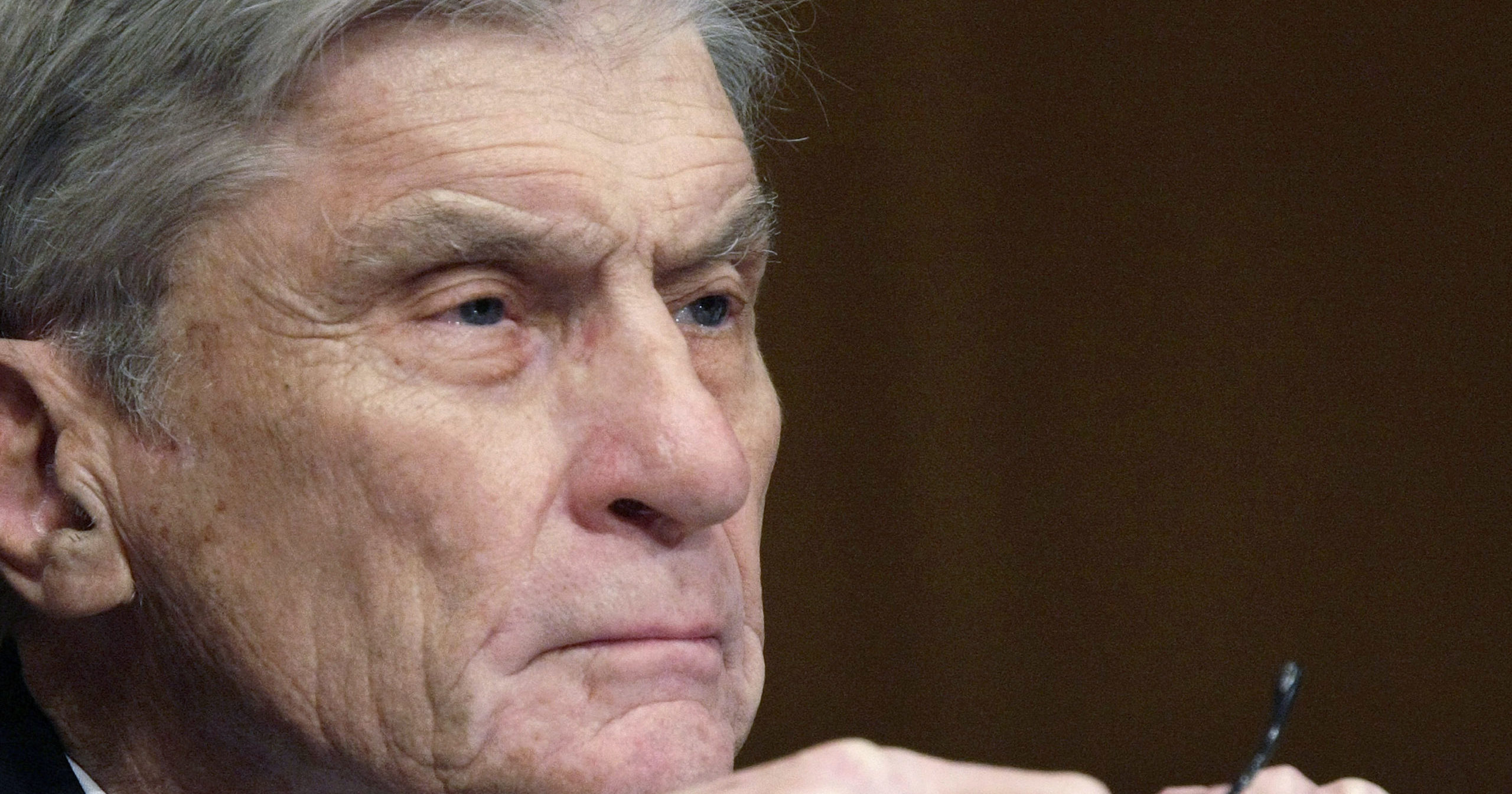 In this April 8, 2008, file photo, then Senate Armed Services Committee member Sen. John Warner, a Virginia Republican, listens to testimony on Capitol Hill in Washington.