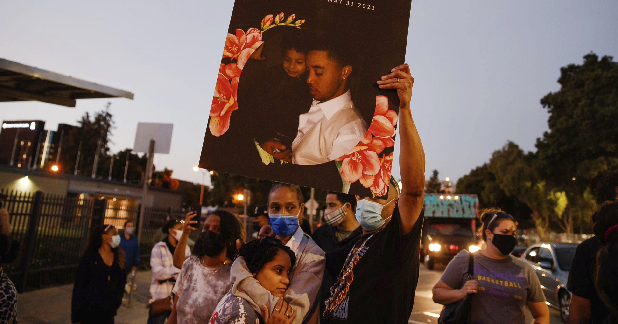 A sign with a picture of Demetrius Stanley on it is held up during a protest in San Jose, California, on Tuesday.