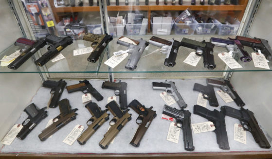 Semi-automatic handguns are displayed at a shop in New Castle, Pennsylvania, on March 25, 2020.