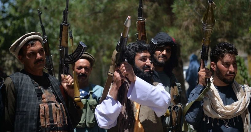 People gather to support Afghan security forces against the Taliban in Guzara district, Herat province on Wednesday.