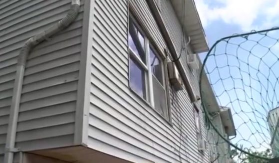 The scene where a 3-year-old boy died after he fell out a window of his home in Elizabeth, New Jersey, is pictured.