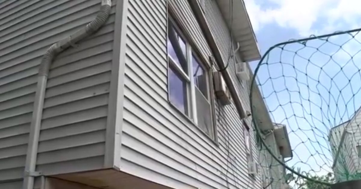 The scene where a 3-year-old boy died after he fell out a window of his home in Elizabeth, New Jersey, is pictured.