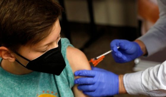 A boy receives the COVID-19 vaccine in Bloomfield Hills, Michigan, on May 13, 2021.
