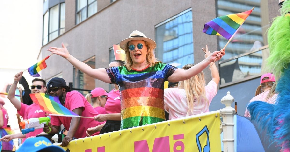 TV personality Marilyn Denis marches with participants on Bloor St. at the 39th Annual Toronto Pride Parade on June 23, 2019, in Toronto.