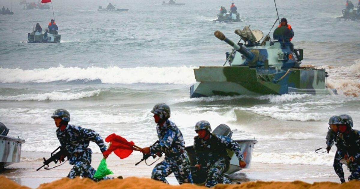 Chinese troops conduct an amphibious landing exercise in waters near Taiwan.