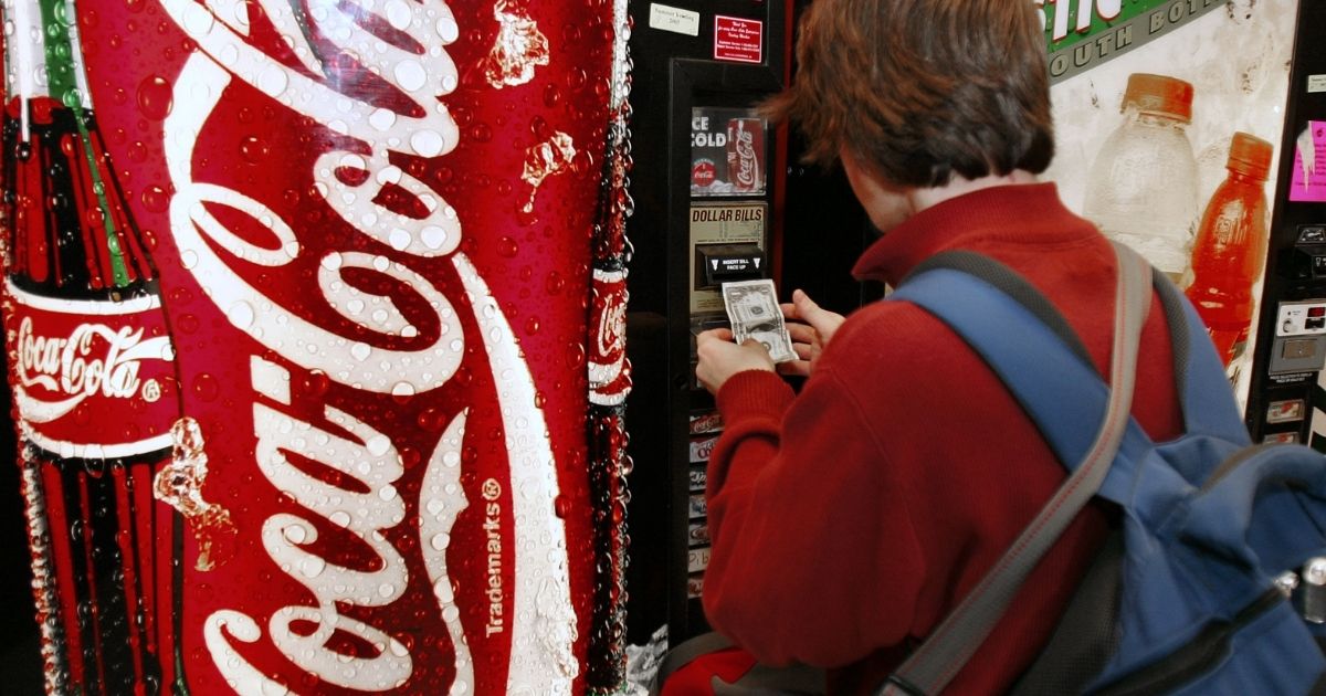 A Student at McLean High School in McLean, Virginia, purchases soft drinks from a vending machine on school property on Dec. 15 2005.