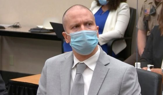 In this image taken from video, former Minneapolis police Officer Derek Chauvin listens as Hennepin County Judge Peter Cahill sentences him to 22 1/2 years in prison on Friday.