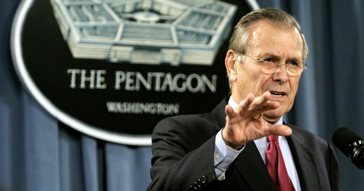 Then-Defense Secretary Donald Rumsfeld gestures during a news conference at the Pentagon on Jan. 11, 2005, in Arlington, Virginia.
