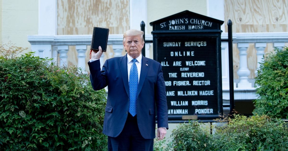 President Donald Trump holds a Bible while visiting St. John's Church across from the White House on June 1, 2020, in Washington, D.C.