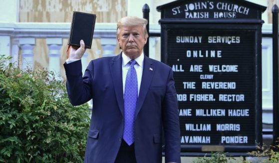 Then-President Donald Trump holds up a Bible outside of St John's Episcopal church across Lafayette Park in Washington, D.C., on June 1, 2020.
