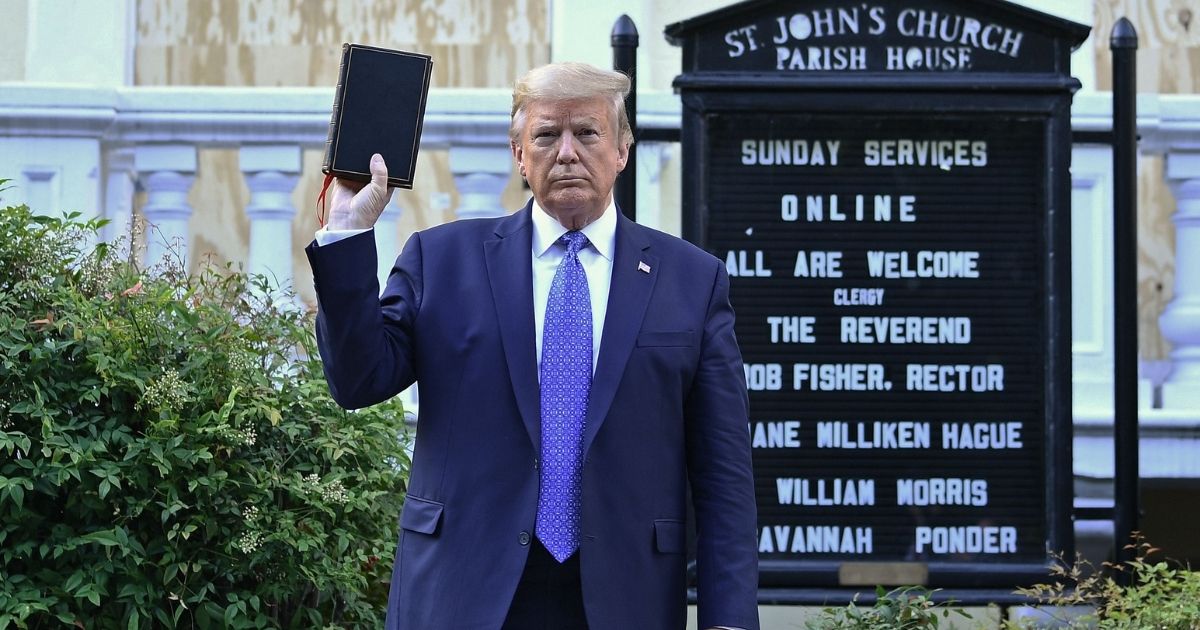 Then-President Donald Trump holds up a Bible outside of St John's Episcopal church across Lafayette Park in Washington, D.C., on June 1, 2020.