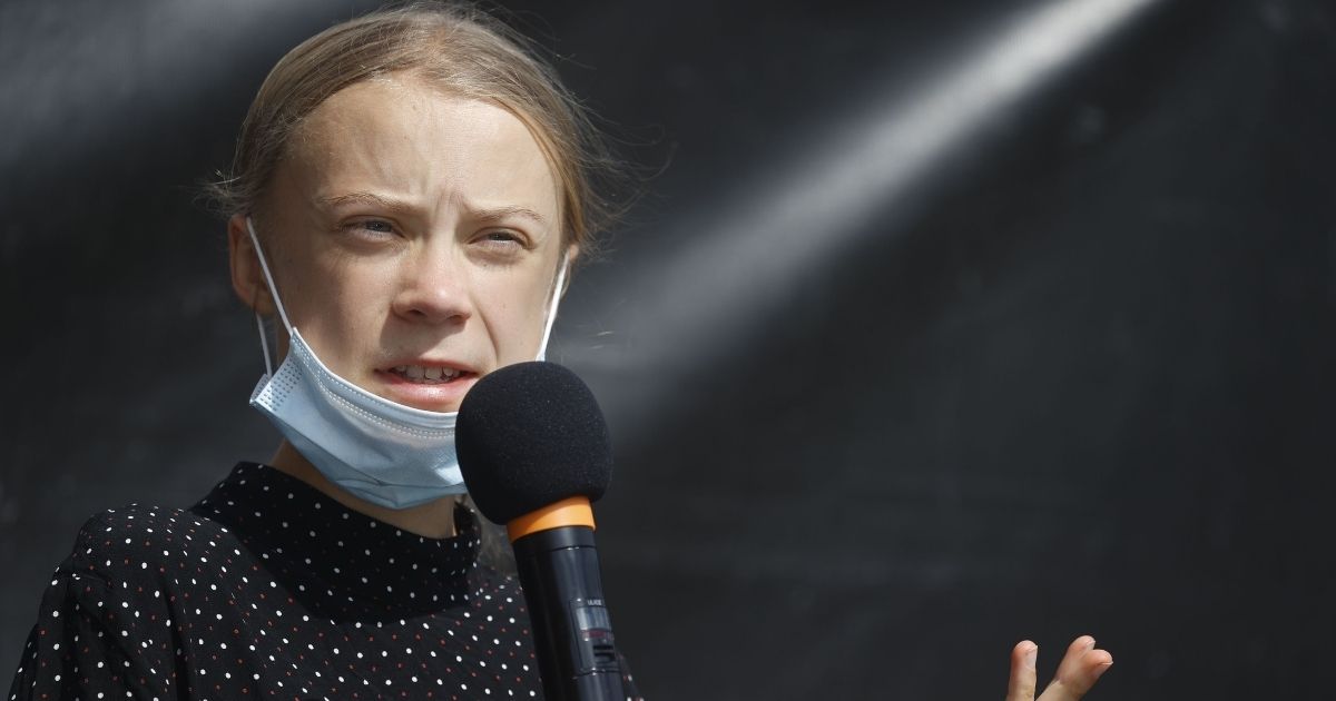 Swedish founder of the "School Strike for Climate" movement Greta Thunberg speaks on the sidelines of talks between representatives of the movement and German Chancellor in Berlin on Aug. 20, 2020.