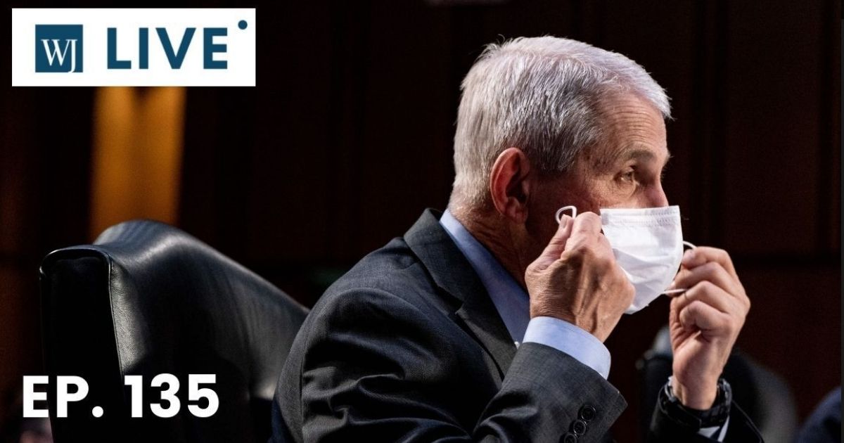 Dr. Anthony Fauci, the director of the National Institute Of Allergy and Infectious Diseases, takes off his face mask during a hearing with the Senate Committee on Health, Education, Labor, and Pensions on the COVID-19 response on Capitol Hill on March 18, 2021, in Washington, D.C.