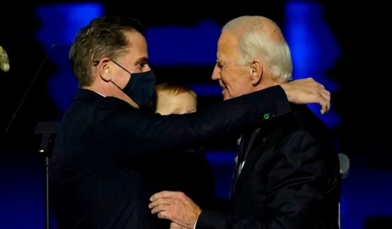 President-elect Joe Biden embraces his son Hunter Biden after addressing the nation from the Chase Center Nov. 7, 2020, in Wilmington, Delaware.