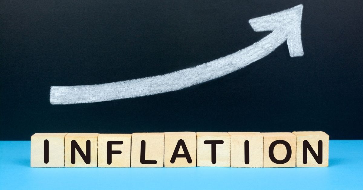 This stock image portrays a set of blocks spelling out "inflation," with an arrow pointing up. The Bureau of Labor Statistics reported that the producer price index surged 0.8 percent in May to clock in at a record 6.6 percent inflation rate for the year.