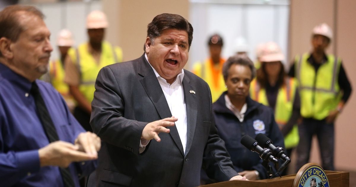 Illinois Gov. J.B. Pritzker speaks during a press conference in Hall C Unit 1 of the COVID-19 alternate site at McCormick Place on Friday, April 3, 2020, in Chicago.