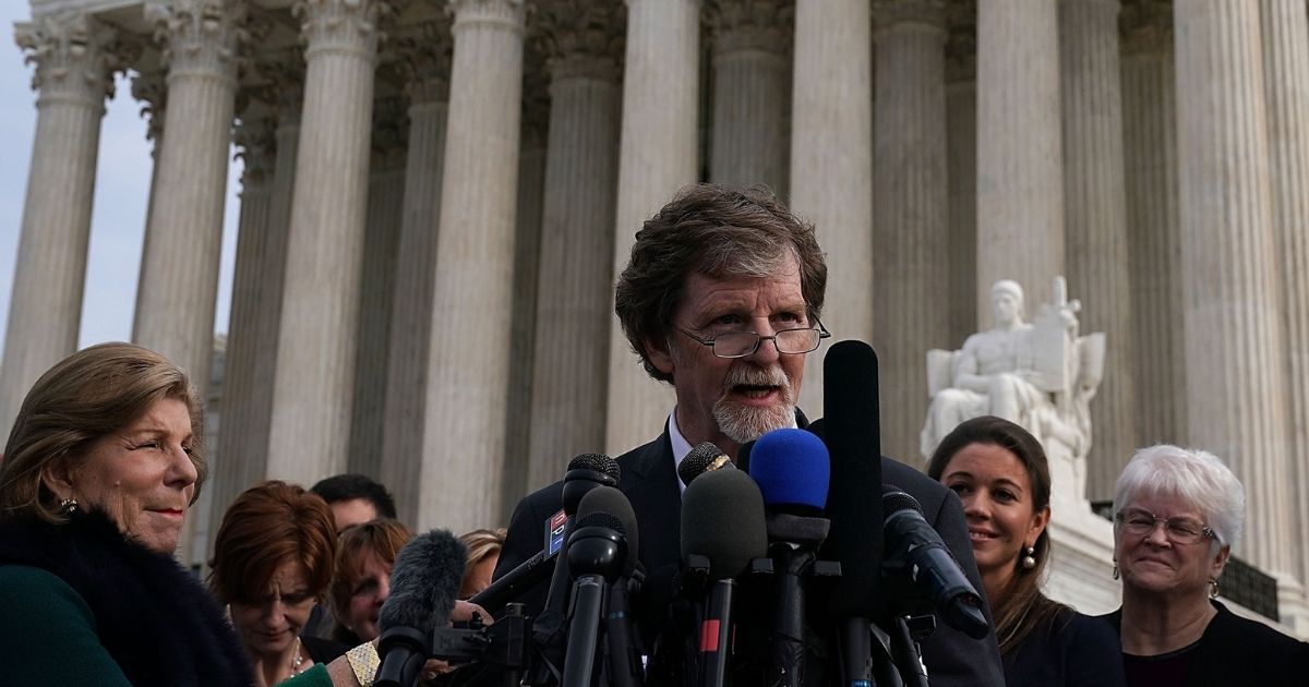 Cake artist Jack Phillips speaks to members of the media in front of the U.S. Supreme Court on Dec. 5, 2017, in Washington, D.C.