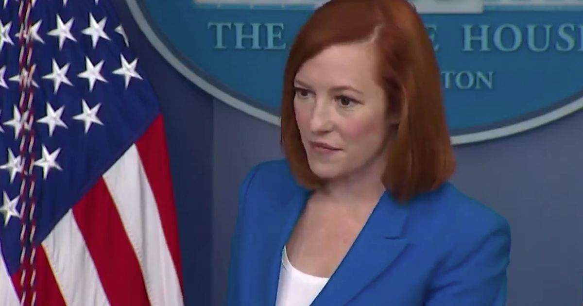 White House press secretary Jen Psaki answers a reporter's question during a Monday news conference.